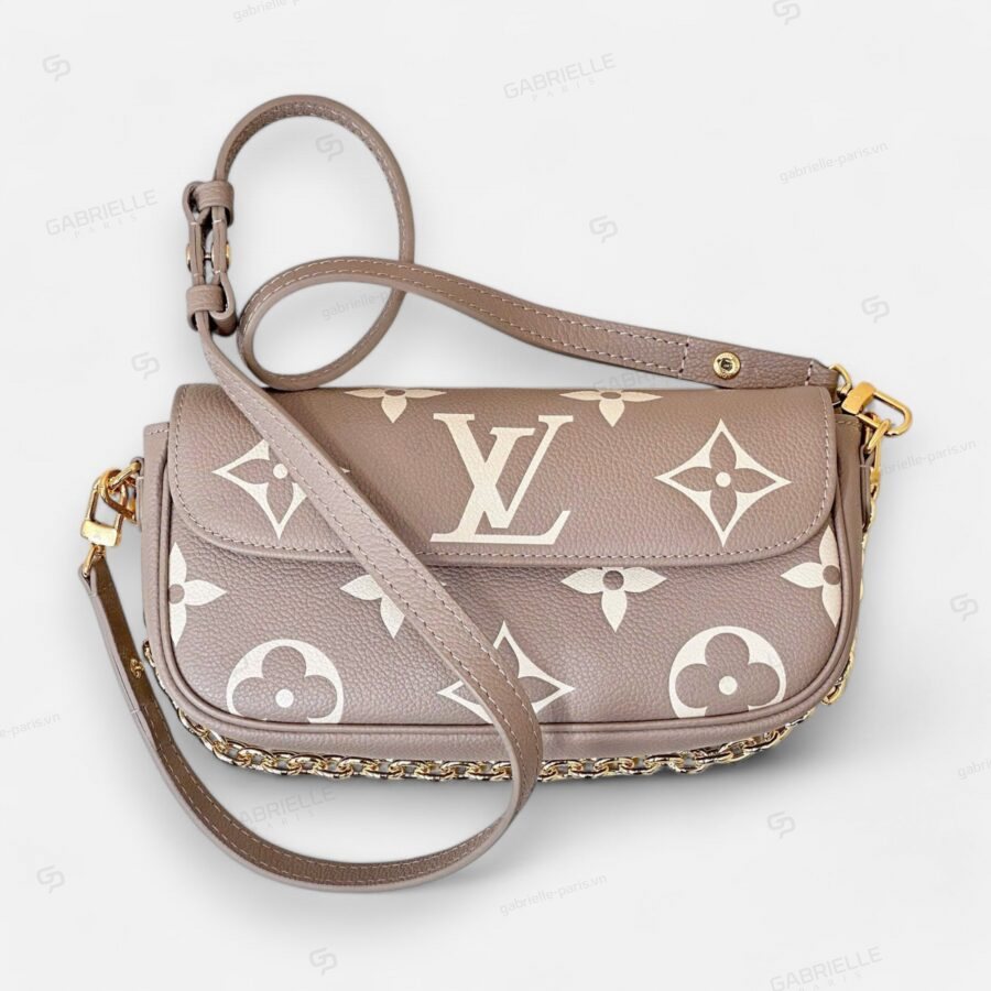 Louis Vuitton Ivy WOC Monogram Empreinte in Gray Bag.